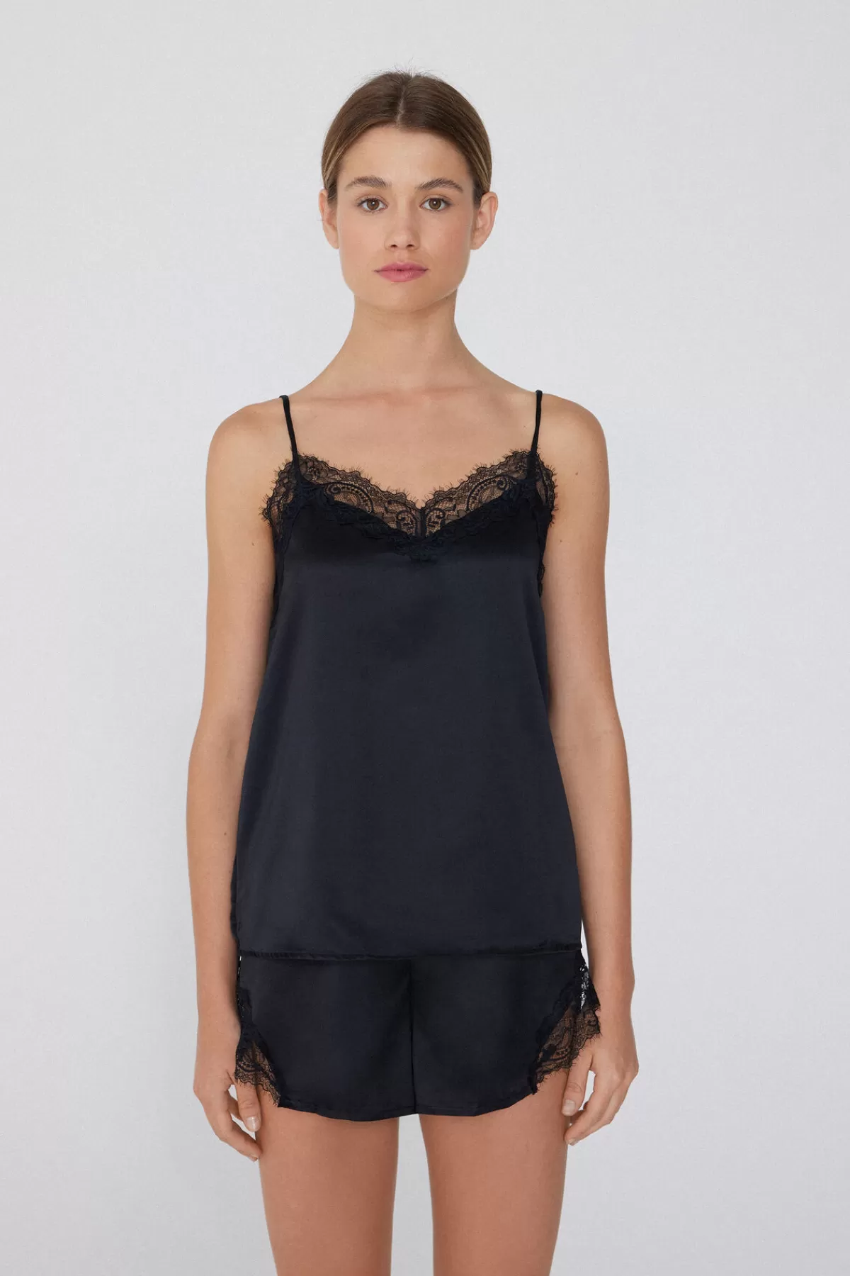 Tezenis Top Senza Maniche Femminile con Dettagli in Pizzo e Raso Setoso  
Dalle sottili spalline a filo, design elegante per un comfort raffinato.