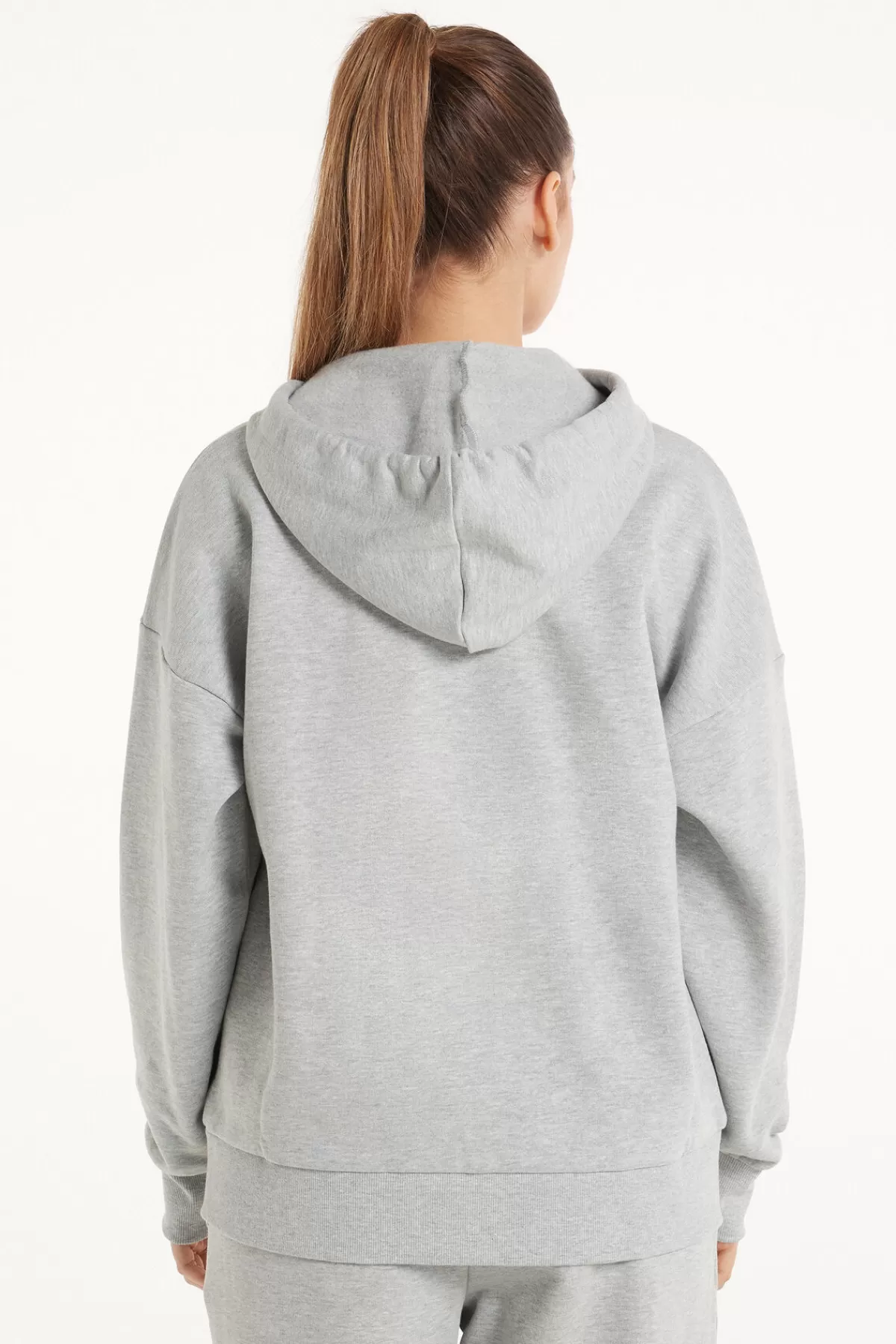 Felpa Invernale Donna con Cappuccio - Tezenis  
Zip Frontale e Maniche Lunghe, Morbida e Avvolgente  
Ideale per Freddo Intenso, Design Pratico e Confortevole